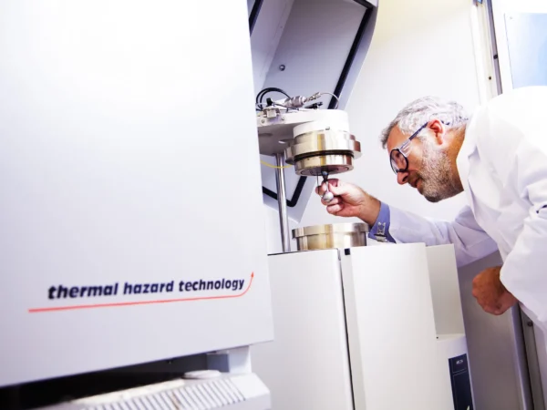 Scientist using equipment for hazardous chemistry at Sterling