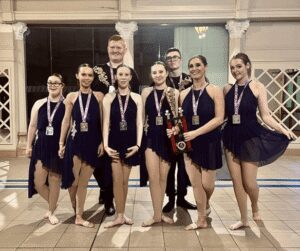 Group photo of the True Colours theatre group after participating at a dance competition in Blackpool