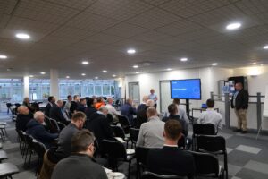 Attendees of the ISPE visit at Sterling Pharma Solutions' facility sitting for a presentation