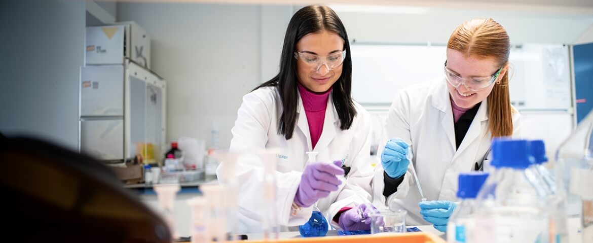 Scientists performing tests
